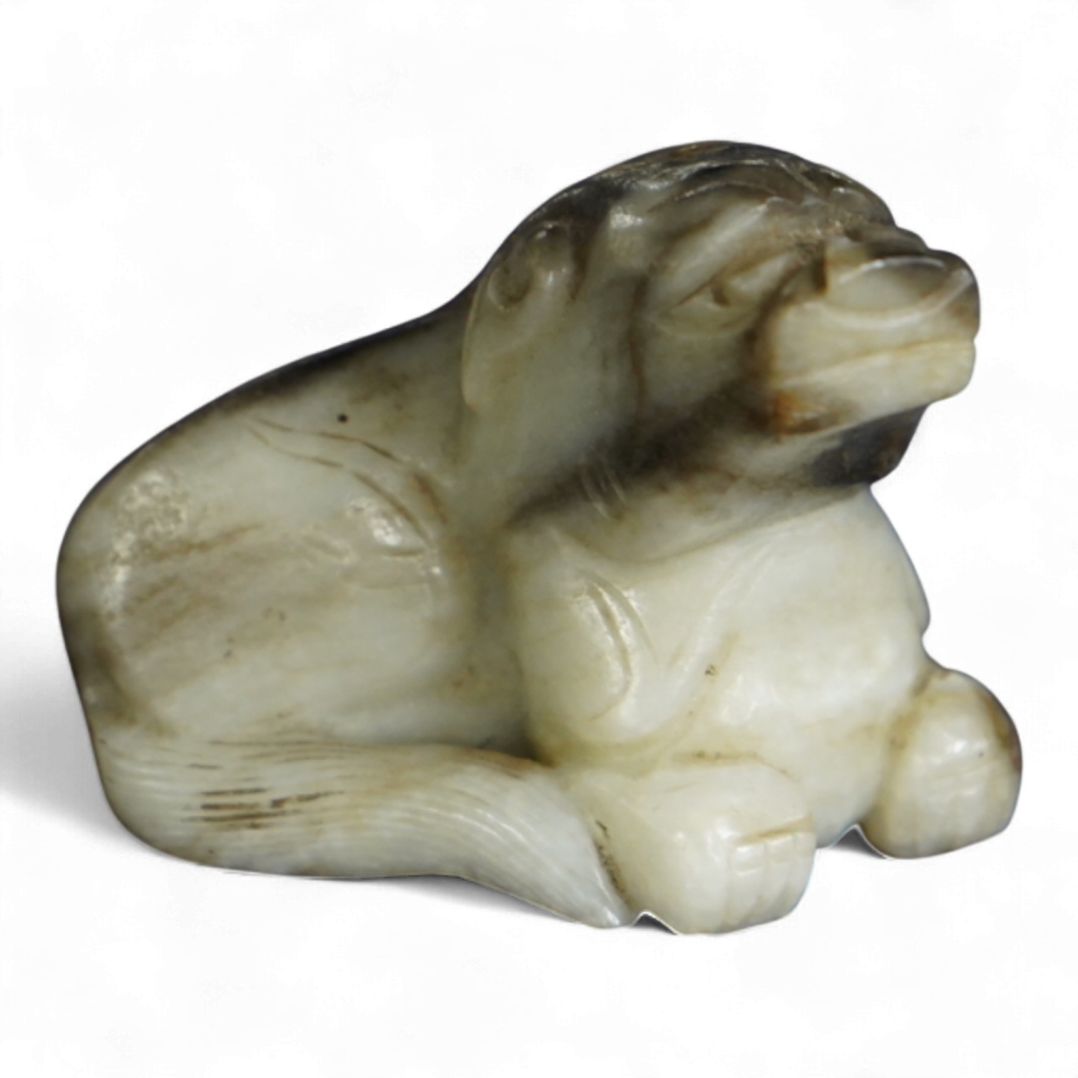 A Chinese white and black jade mythical beast, 5cm wide